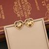 [Ice Meng] Aretes de amor estilo Maillard aretes de acero inoxidable joyería transfronteriza europea y americana para E559