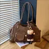 Bolso grande de alta gama de gran capacidad para mujer 2026 nuevo moderno de moda para el trabajo, bolso tote versátil de un solo hombro cruzado
