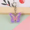 Novo Chaveiro Borboleta Colorida Fofa 2D Pingente para Mochila Escolar de Menina Acrílico Encanto Acessório de Desenho Animado Fofo