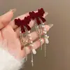 Otoño e Invierno flocado lazo borla de perlas clip para oreja pendientes sin perforar retro francés vino tinto lujo ligero pendientes súper de hada