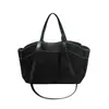 Bolsa tote de alta calidad y gran capacidad, una bolsa popular para mujer para otoño, con un diseño nuevo, un bolso de hombro elegante y sencillo, y un bolso tipo cubo versátil