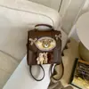 Bolsa Fashion com Textura Retrô para Mulheres 2026 Primavera Nova Mochila Casual Elegante para o Dia a Dia Bolsa Transversal de Nicho