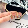 Brincos da Moda Estilo Coreano Mais Vendidos Novo Modelo Brincos Femininos Simples e Elegantes Versáteis Tiktok Mesmo Estilo Tarraxas Atacado