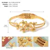 Pulsera abierta de acero de titanio tipo brocado con flores, moda europea y americana de alto nivel, pulsera de flores, artículo popular transfronterizo, pulsera versátil para uso diario
