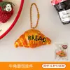 Novo Brinquedo de Comida de Simulação Pingente de Pão Doce Feminino Versátil Chaveiro de Resina Pingente de Decoração de Bolsa Atacado