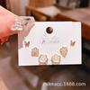 Verano nuevo chapado en oro real exquisitos tres pares de aretes pequeños de alto sentido pequeños frescos dulces aretes de temperamento combinables
