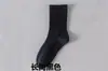 Calcetines de algodón de Xinjiang para hombre, calcetines de longitud media, verano, absorbentes de sudor, desodorantes, antibacterianos, deportivos, calcetines para estudiantes negros y blancos