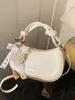 Bolso de Mano de Nicho Francés para Mujer 2025 Nuevo Bolso Cruzado Casual Versátil Bolso de Hombro de Moda Estilo Occidental Bolso Cruzado tipo Sillín