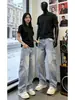 Jeans lavados de mezclilla azul, corte slim, dobladillo curvo para hombre, estilo fino de verano, estilo americano, pantalones elegantes y de alta gama, pantalones de trabajo Xintang