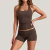 Conjunto de fitness europeo y americano transfronterizo, conjunto de dos piezas de top sin mangas de cuello halter de color liso y shorts ajustados, atuendo deportivo de running y yoga para mujer