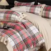 Juego de cuatro piezas simple y de alta gama 100% algodón puro engrosado cepillado, ropa de cama cálida para otoño e invierno estilo botón, impresión digital 100% algodón