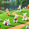 Nuevo producto transfronterizo: Lindo peluche de conejo sosteniendo un huevo de Pascua, accesorios de decoración DIY, mini adornos colgantes