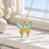 Collar de mariposa de esmalte vintage europeo y americano, cadena de clavícula de circón para mujer, nicho y fresco, joyería de cadena para el cuello estilo ins transfronterizo