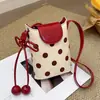Bolso de teléfono de lunares transfronterizo, súper popular, nuevo estilo 2026, para mujer, adecuado para ir al trabajo, dulce y elegante para el verano, uso diario, bolso de hombro o bolso cruzado