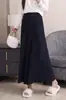 Esta falda plisada de punto gris presenta un corte súper favorecedor y es una falda larga nueva de estilo coreano, versátil, para mujer, perfecta para la temporada otoño/invierno 2026
