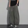 Pantalones de trabajo plisados estilo americano para hombre, diseño moderno primavera/verano, pantalones casuales curvos, pantalones largos versátiles holgados vintage