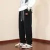 Pantalones Deportivos de Pana para Hombre 2025 Otoño e Invierno Nuevos Sueltos Rectos Casuales Gruesos de Pierna Ancha Largos