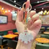 Popular llavero de murciélago de arcilla de doble cara incrustado con diamantes, pequeño colgante de Halloween para niñas, exquisito charm de bolso con cuentas de cristal