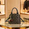 Bolsa Popular Transfronteriza Más Vendida para Mujer 2026 Nuevo Súper Caliente Monograma Cadena Bolsa tipo Concha Versátil Bolso de Hombro Único Cruzado