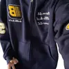 Ropa exterior versátil estilo Hong Kong para primavera/otoño 2026: sudadera con capucha holgada de diseño de letras estampado de moda para hombre