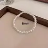 Atacado Transfronteiriço de Pulseiras de Pérolas Shijia, Pulseiras de Moda de Luxo Leve Estilo Francês, Acessórios de Mão Versáteis Elegantes de Luxo Leve para o Dia a Dia