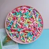 Nuevos dibujos animados mixtos tamaño pequeño hielo a través de Sanrio diy accesorios de resina pegamento crema funda para teléfono móvil accesorios para pinzas para el cabello