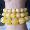 Pulsera de Cera de Abeja Fluorescente Flotante en Agua Salada Segunda Generación Alta Imitación Ámbar Pulsera de Perlas de Cera de Abeja Atracciones para Hombres y Mujeres Explosiones en Vivo