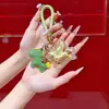 Llavero Dorado con Acabado de Alta Gama, Colgante del Año del Caballo, Oro Puro, Riqueza Instantánea, Adorno para Bolso, Regalo de Año Nuevo