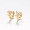 Pendientes Xuping de Cruz Hueca Mariposa Círculo Geométrico Europeos y Americanos Transfronterizos para Mujer, Aleación de Cobre Chapada en Color 14K, Pendientes Personalizados