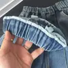 Roupas novas para crianças 2026, coleção de outono para meninos, calças estilo workwear com bolsos grandes, jeans do papai, jeans de perna curva, atacado