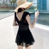Traje de baño para Mujer Verano Hada Una Pieza 2025 Nuevo Conservador Estilo Falda Look Adelgazante Cubre Vientre Traje de Baño Negro Sexy Coreano Ins