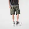Pantalones deportivos casuales de color liso, holgados y de moda para verano transfronterizos, shorts de cinco puntos a la moda, shorts casuales estilo Hong Kong para el trabajo