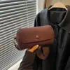 Bolsa cilíndrica de nicho para comércio exterior para mulheres, nova bolsa de ombro versátil da moda 2026, bolsa transversal simples retrô da moda para o dia a dia