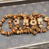 Estilo Casual de Cocinero con Madera de Durazno Grano de Café Lavado Oso Pulsera Círculo Único Plato de Mano con Cuentas Budistas Pulsera de Rosario