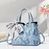 Bolso de mujer texturizado de alta calidad, bolso de mano nuevo, bolso de hombro y cruzado, nuevo bolso de hombro versátil de otoño 2026