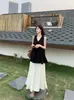 Top Colete Sem Mangas Design Estilo Francês para Mulheres Verão 2026 Estilo Hepburn Versão Coreana Conjunto de Duas Peças Saia Spicy Girl