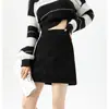 Falda Bodycon de Seda Brillante 2025 Estilo Nuevo de Principios de Otoño Forro Anti-Exposición Cintura Alta Adelgazante Línea A Negra Versátil Falda Corta