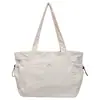 Bolsa de lona ligera estilo coreano, con múltiples compartimentos, gran capacidad y diseño versátil para ir al trabajo y uso casual; disponible para venta al por mayor