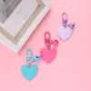 Nuevo llavero Bell love colgante lindo color resina corazón de durazno accesorios pequeño fresco adornos de corazón de durazno