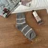 Calcetines de Rayas para Mujer 2025 Otoño Nuevos Calcetines de Media Caña con Bloques de Color Simples Moda Versátil Calcetines Holgados sin Costuras Zhuji