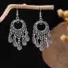 Aretes colgantes de moda huecos para mujer de estilo exótico europeo y americano transfronterizo, retro, literario, clásico y digno, con gancho para la oreja que combinan con todo