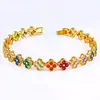 Pulseira Colorida de Pedra Preciosa Flor de Trevo de Quatro Folhas Transfronteiriça Europeia e Americana, Fashionável e Versátil, Luxo Leve com um Toque de Alto Padrão, Pulseira de Cobre Cravejada com Zircônia de Diamante Completo