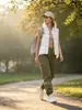 Moda al por mayor para mujer europea y americana 2026: Chal de Trabajo Elegante y Estiloso con Cordón, Bolsillo Elástico Abotonado y Cuello Alto