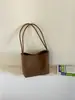Comercio exterior transfronterizo estilo coreano nicho bolso de mano bolso cubo simple versátil bandolera única bolso de viaje retro moda bolso de axila