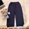 Calças de pijama femininas, calças de algodão bolha para caminhada, calças estampadas com desenhos animados, calças xadrez para homens e mulheres, calças de casal para uso externo