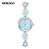 Mokago Nuevo Reloj para Mujer Camelia Moda Lujo Ligero Delgado Acero Correa Exquisito Impermeable Cuarzo