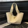 Bolsa grande de alta qualidade para mulheres, nova versão coreana 2026, versátil e estilosa, grande capacidade, elegante bolsa tote feminina, bolsa de ombro