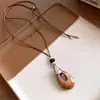 Collar con cordón de cuero, acrílico, madera, colgante de gota de agua, nuevo estilo chino, cadena para suéter de diseño vintage de alta gama