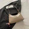 Bolsa de Axila Personalizada da Moda Feminina 2026 Novo Estilo Coreano Tendência Ombro Único Textura Laço Estiloso Bolsa Meia-Lua para o Trabalho