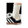 Calcetines largos a rayas y de lunares, modernos, dulces y lindos, para estudiantes, estilo coreano, perfectos para otoño e invierno, con etiqueta de tela y longitud hasta la mitad de la pantorrilla.